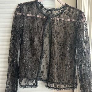 Beaded, sheer top.  Great for holiday and formal occasions.